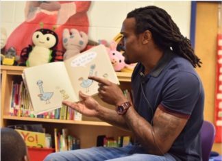 NFL Player Brandon Carr Brings the Joy of Reading Back to Children
